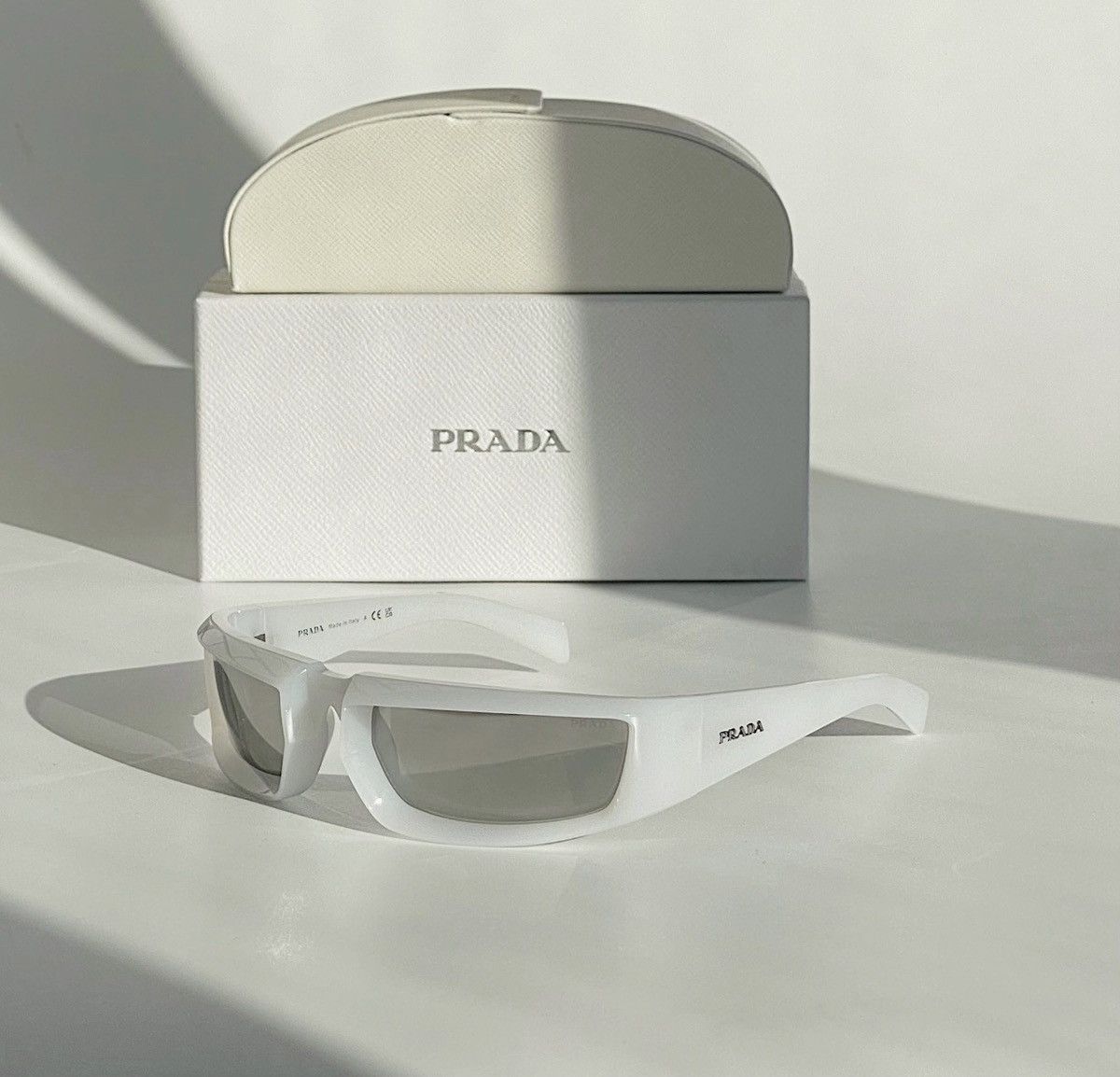Prada PRADA Raf Simons Chrome Lenses Wrap Logo Sunglasses SPR29Y Size ONE SIZE - 1 Thumbnail
