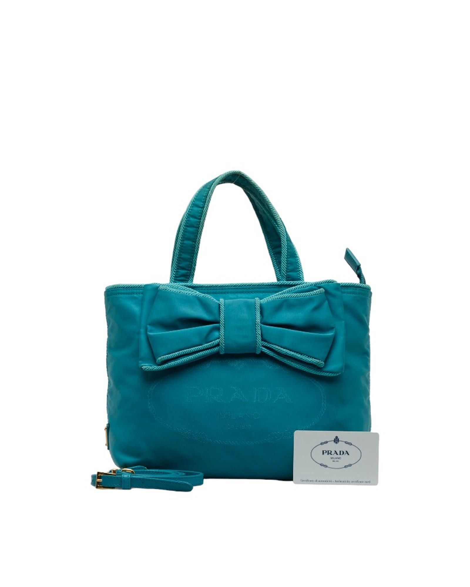 image of Prada Blue Bow Handbag In Ab Condition, Women's
