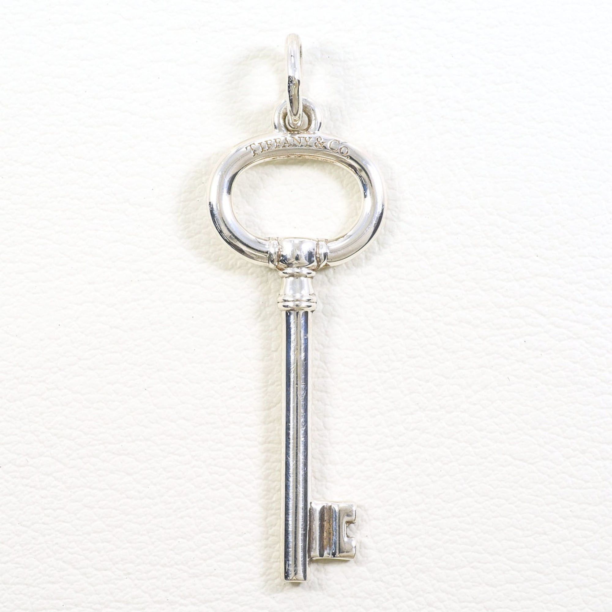 Tiffany & Co. Key Pendant in Sterling Silver (925) Approx. 2.0g Total Weight Like New Free Shipping Gift Wrapping Available