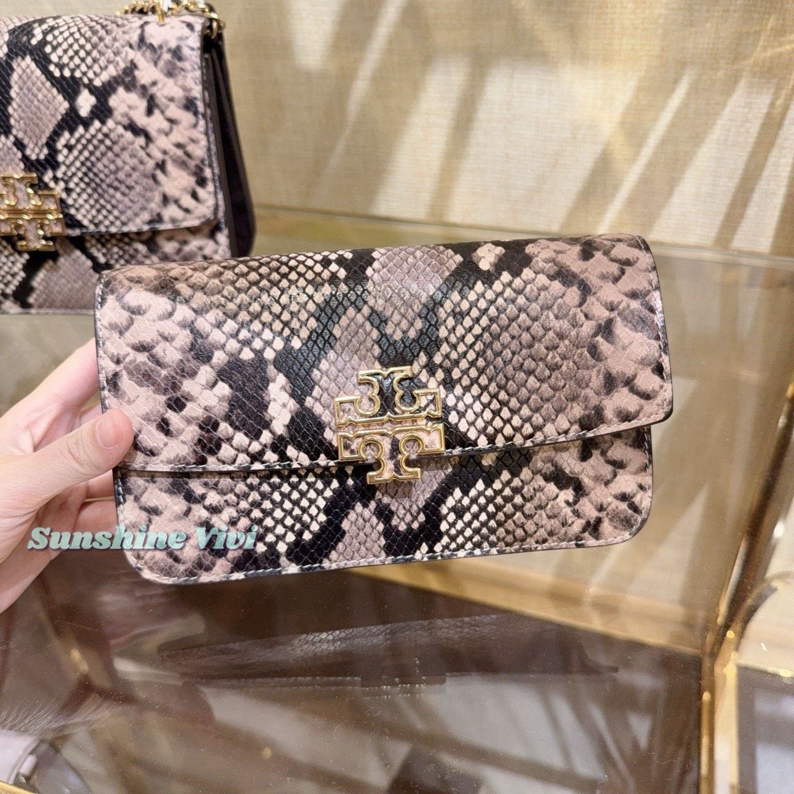 Tory Burch NWT Tory Burch BRITTEN SNAKE EMBOSSED WRISTLET SHELL PINK Size ONE SIZE - 1 Thumbnail