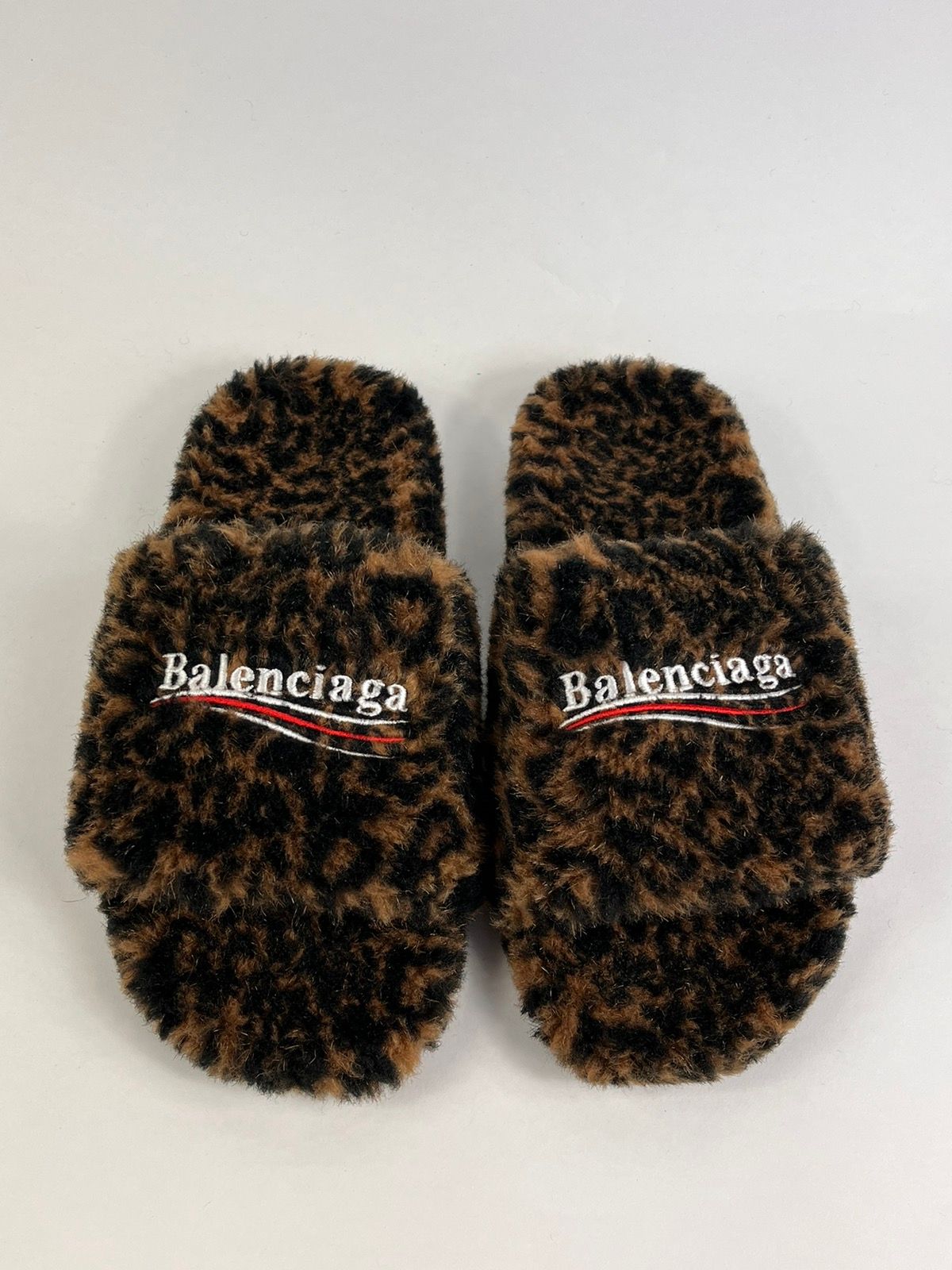 Pre-owned Balenciaga Logo Embroidered Leopard Furry Slides In Brown