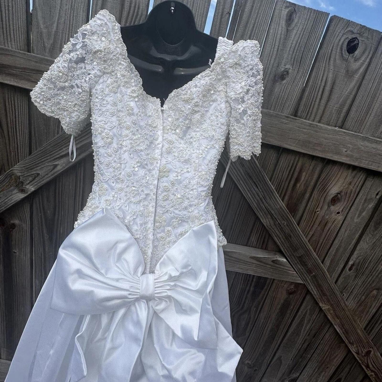 White lace vintage wedding dress with beaded