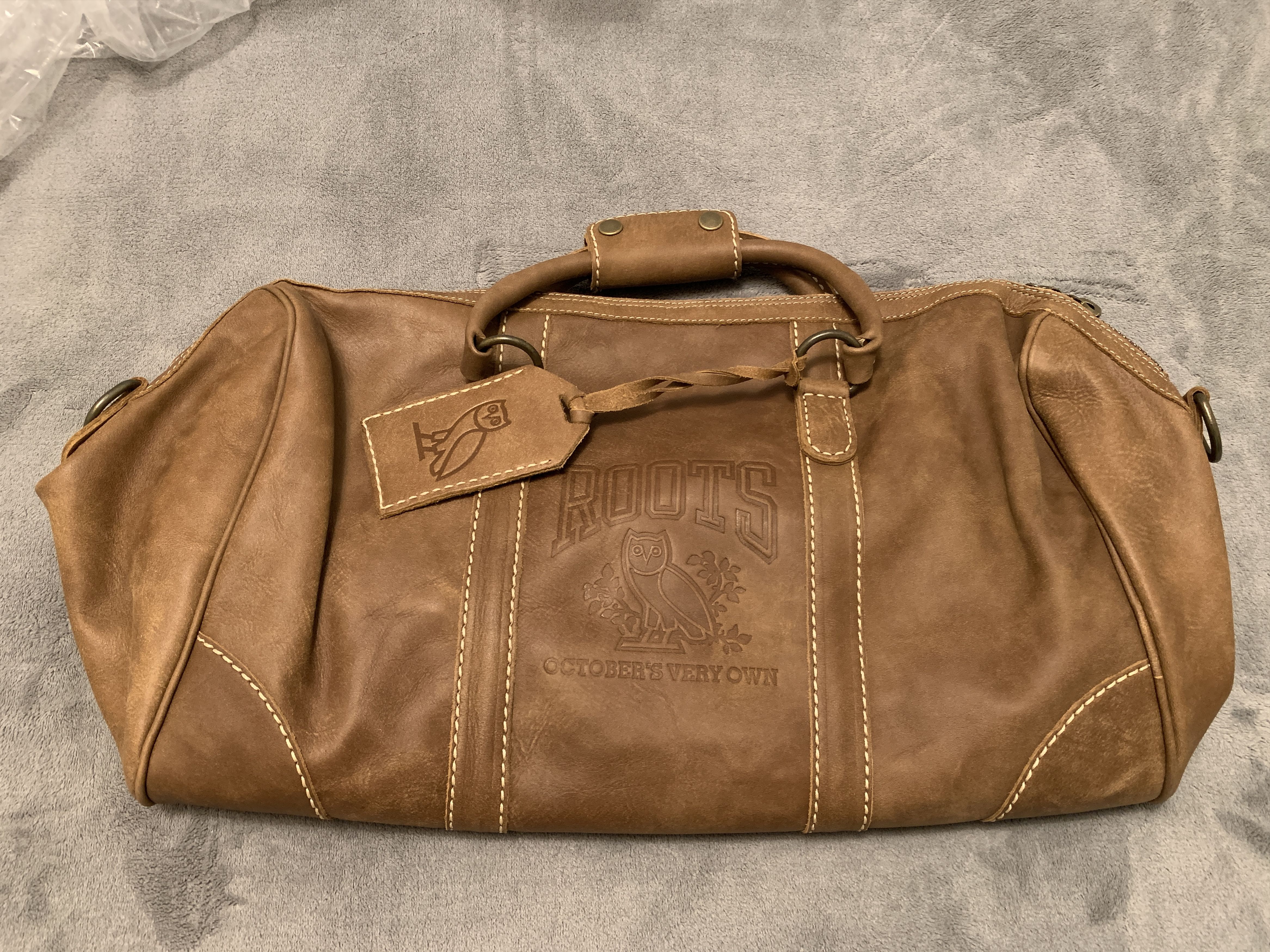 image of Drake x Octobers Very Own Ovo Roots Duffle Bag Genuine Leather 2021 in Brown, Men's