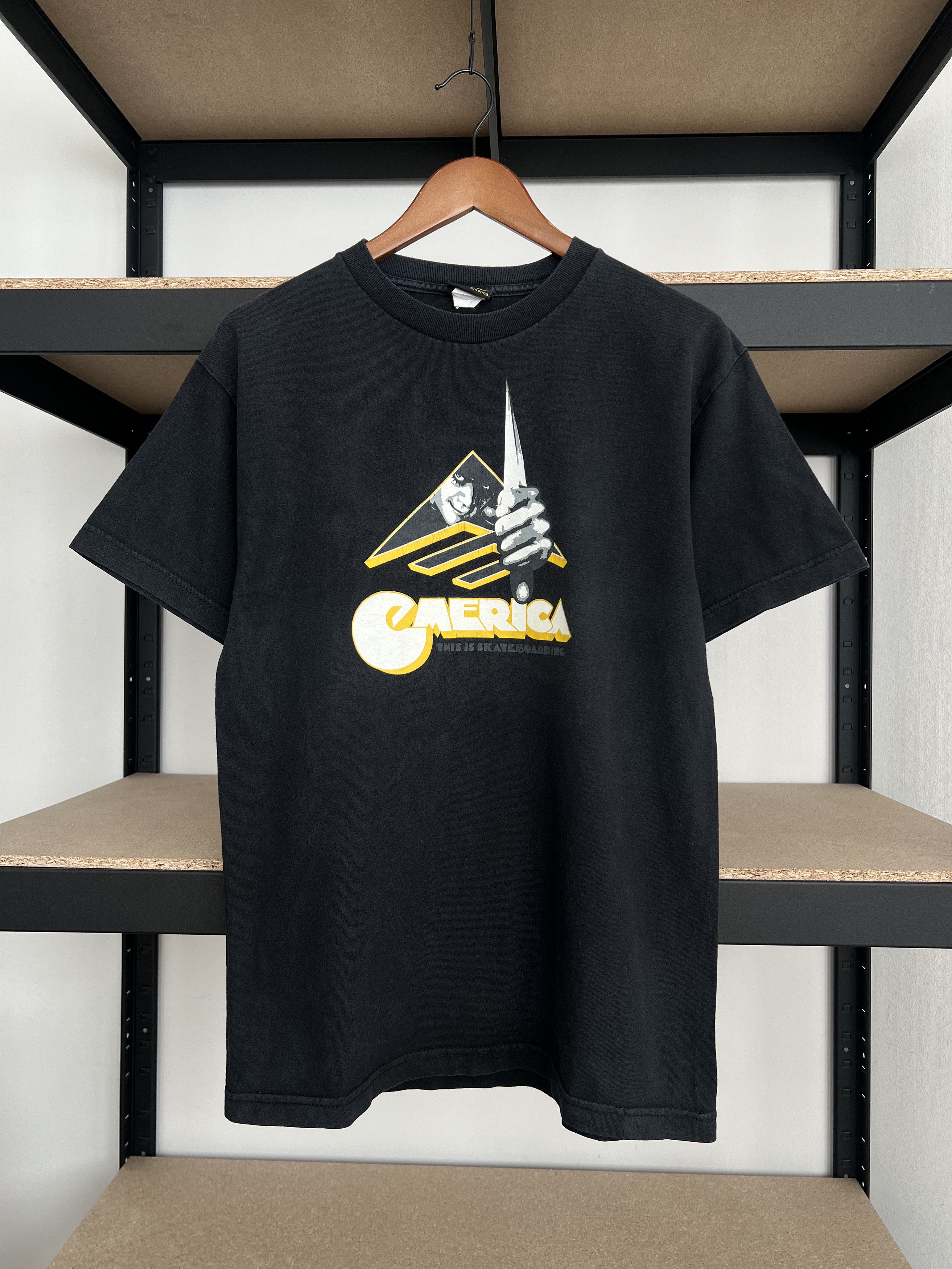 image of Vintage 2000S Emerica Skateboards Clockwork Orange Black Tee, Men's (Size Medium)
