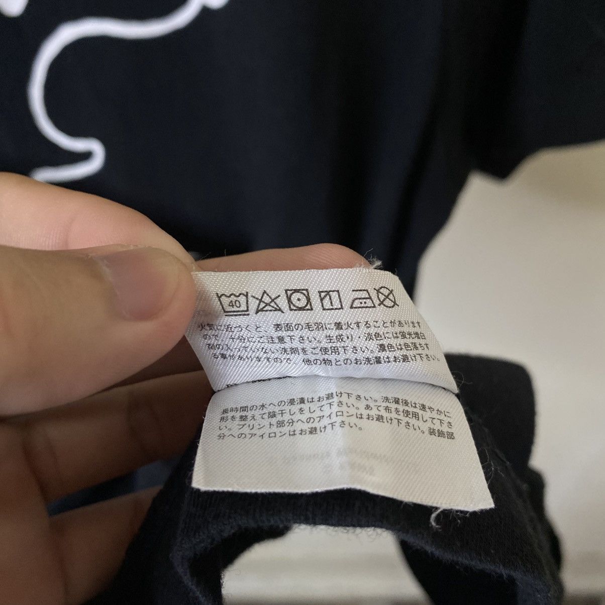 Kaws × Peanuts × Uniqlo Kaws x Snoopy For Uniqlo Collaboration T Shirt Size US S / EU 44-46 / 1 - 6 Thumbnail