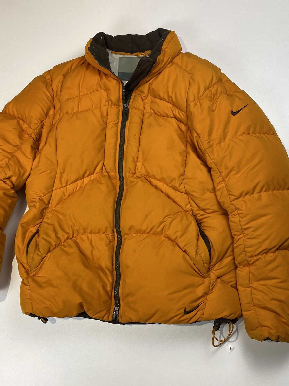 Nike orange small logo padded jacket hotsell