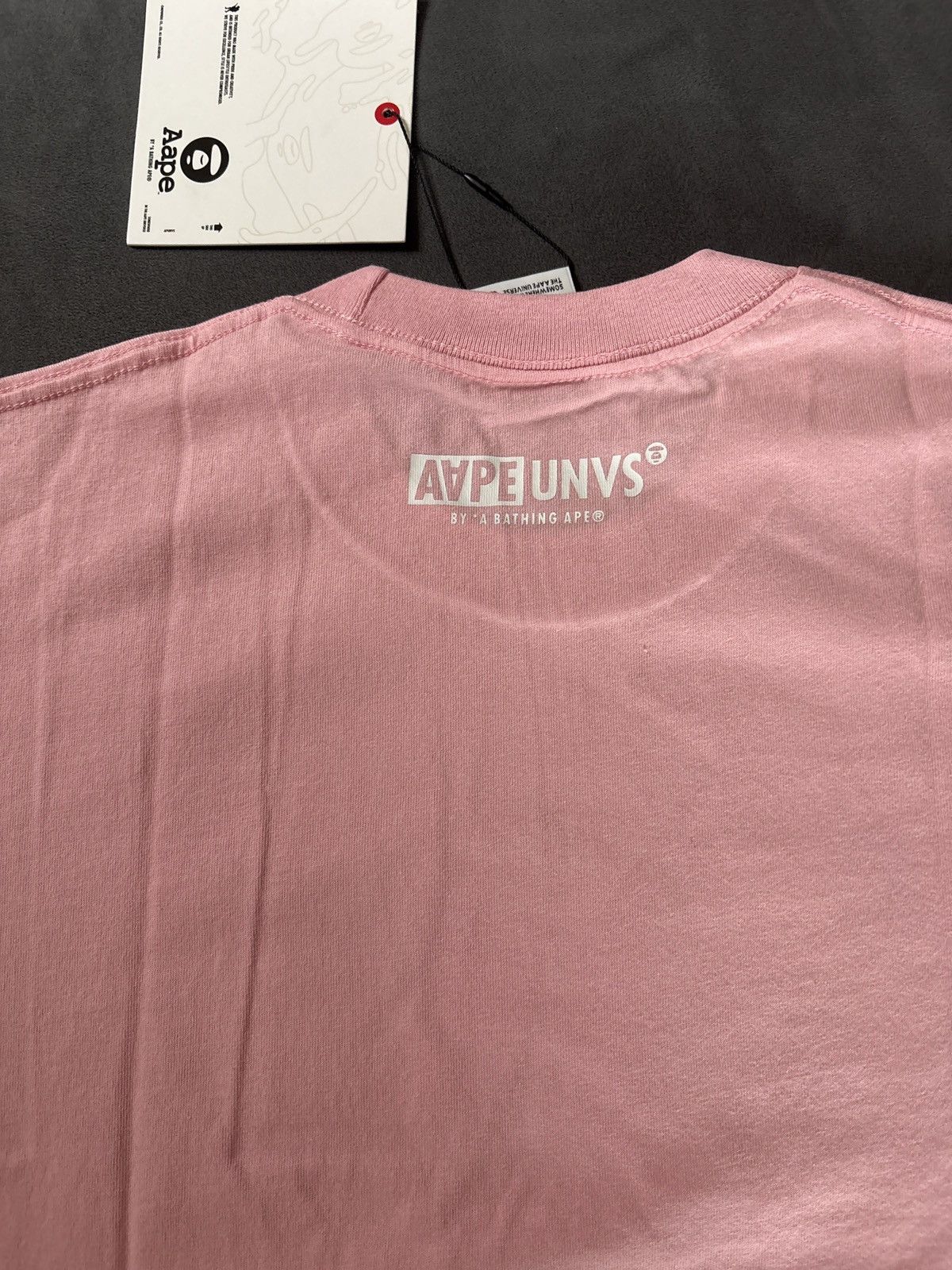 Aape × Bape Aape t-shirt pink purple and blue ape face Size US S / EU 44-46 / 1 - 7 Thumbnail