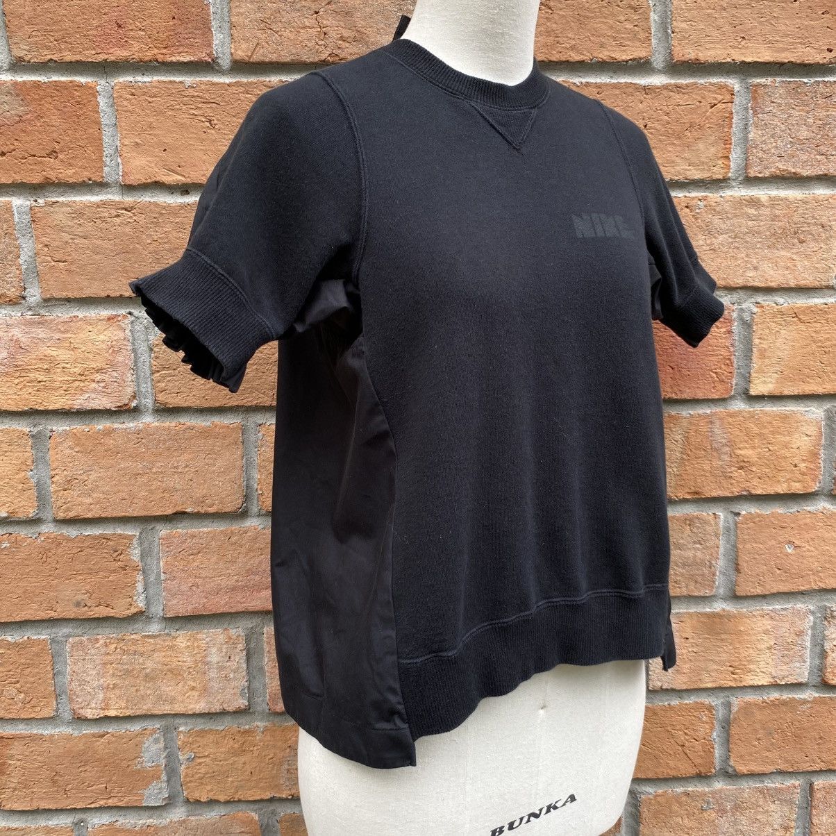 Sacai X Nike Black Short Sleeve Nike Top with Ruffle Trim