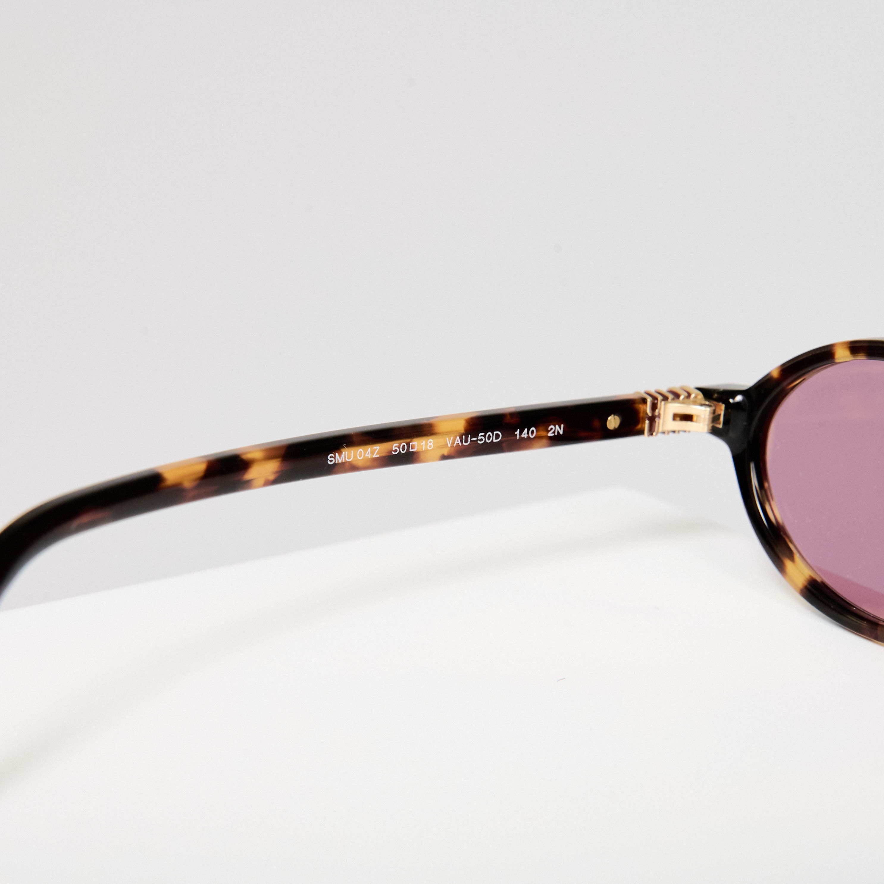 Miu Miu MIU MIU MU 04ZS VAU50D Eyewear HONEY Size ONE SIZE - 5 Thumbnail