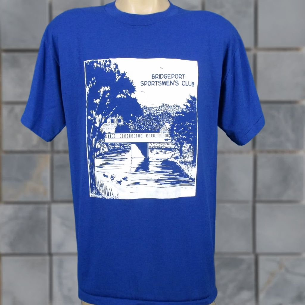 Vintage vintage 80s BRIDGEPORT SPORTSMEN’S CLUB BUTTERY SOFT T-Shirt LARGE blue 80s Mens Shirt"} Size US L / EU 52-54 / 3 - 1 Thumbnail
