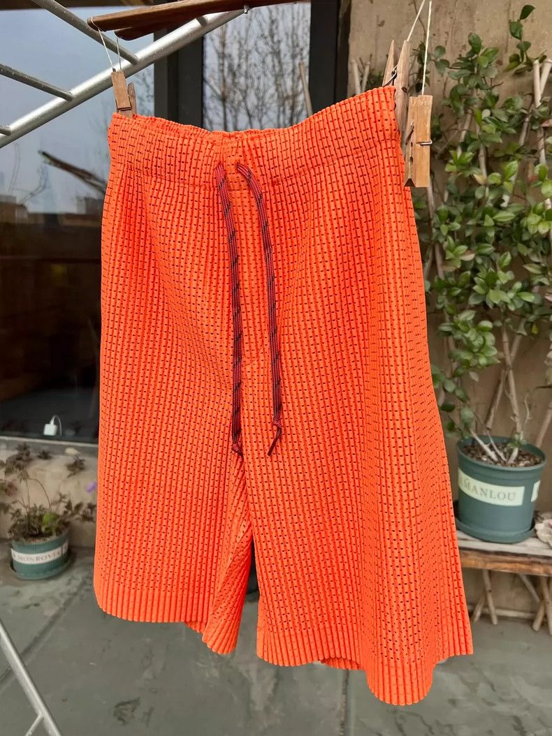 Issey Miyake Issey Miyake size:2 Orange cut-out shorts Size 23" - 1 Thumbnail