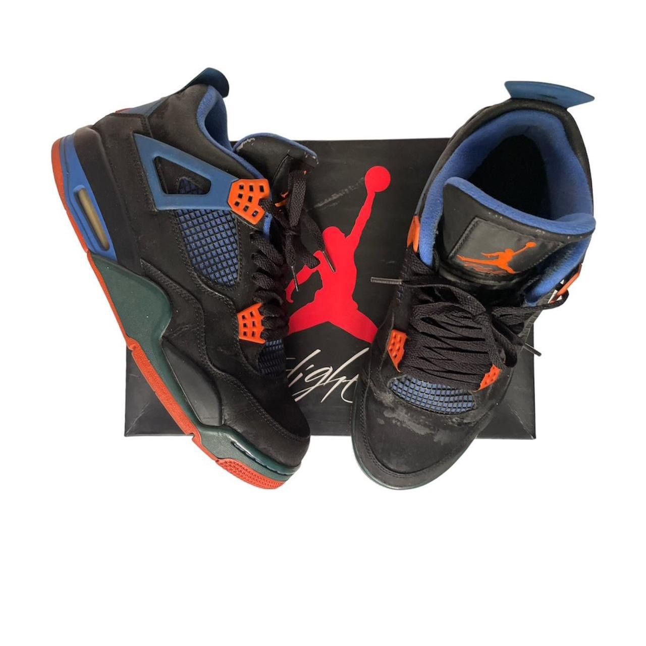 image of Jordan Brand Cav 4 Shoes in Black/Blue/Orange, Men's (Size 10)