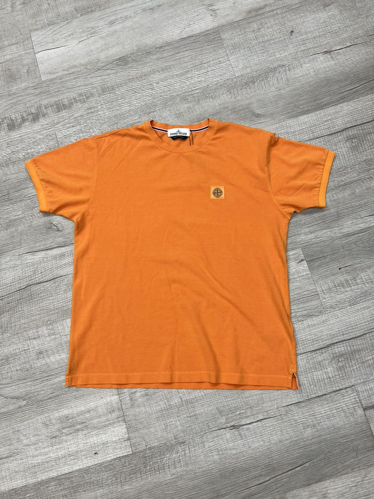 Orange stone island t shirt hotsell