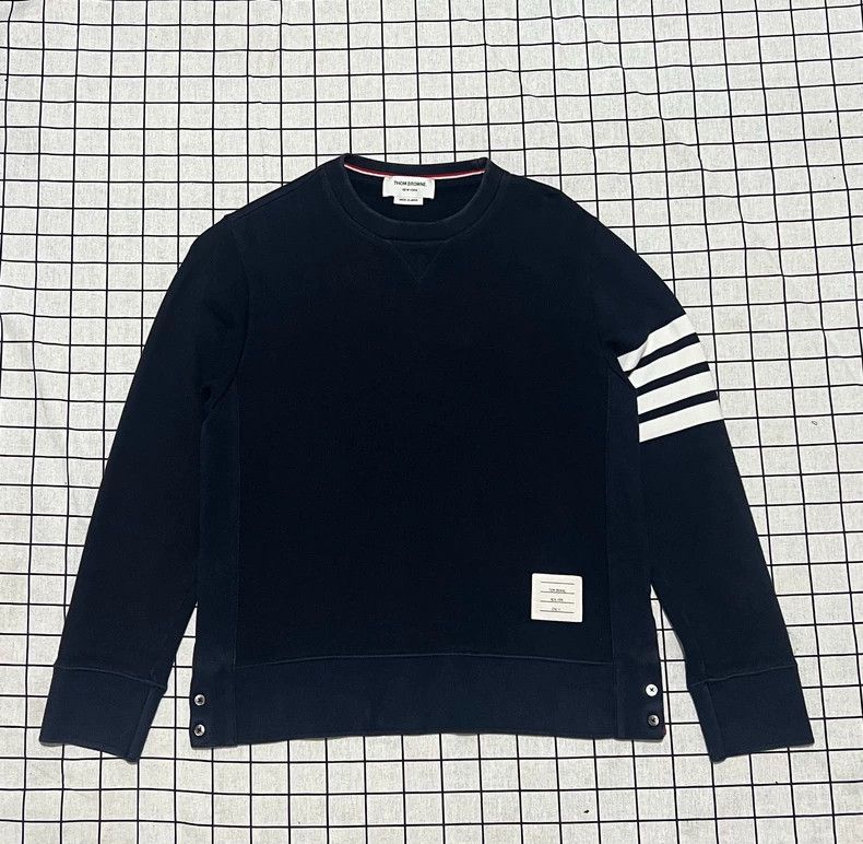 Thom Browne A dark blue four-striped hoodie