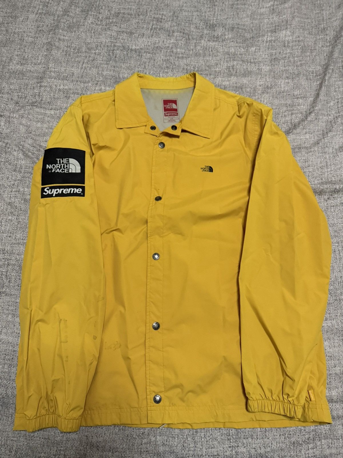 Supreme tnf coach jacket online