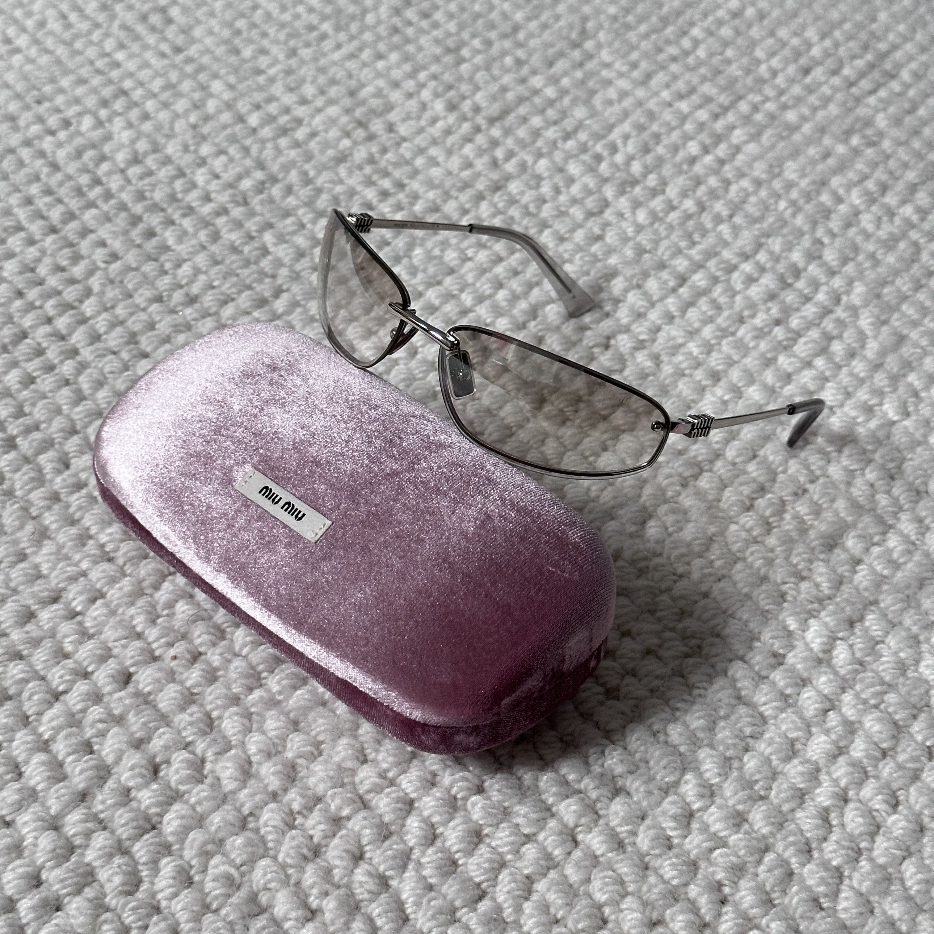Miu Miu MIU MIU 0MU A50S 1BC8H1 | Grailed