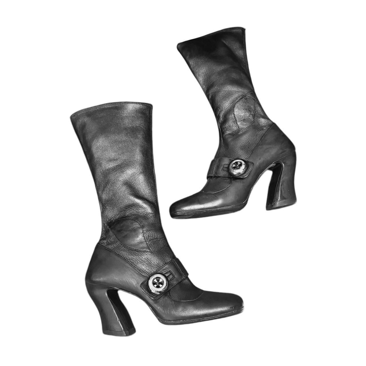 Prada archive leather boots asymmetric heel button detail.