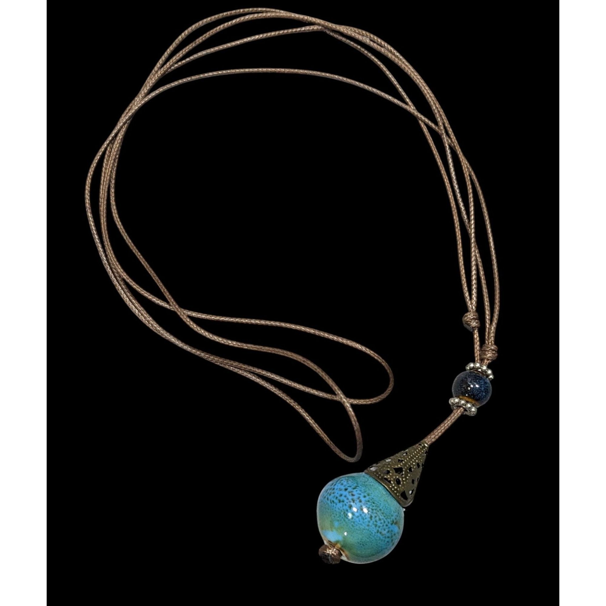 Other Bohemian Fantasy Blue Ceramic Pendant Necklace On Brown Cord Size ONE SIZE - 1 Thumbnail