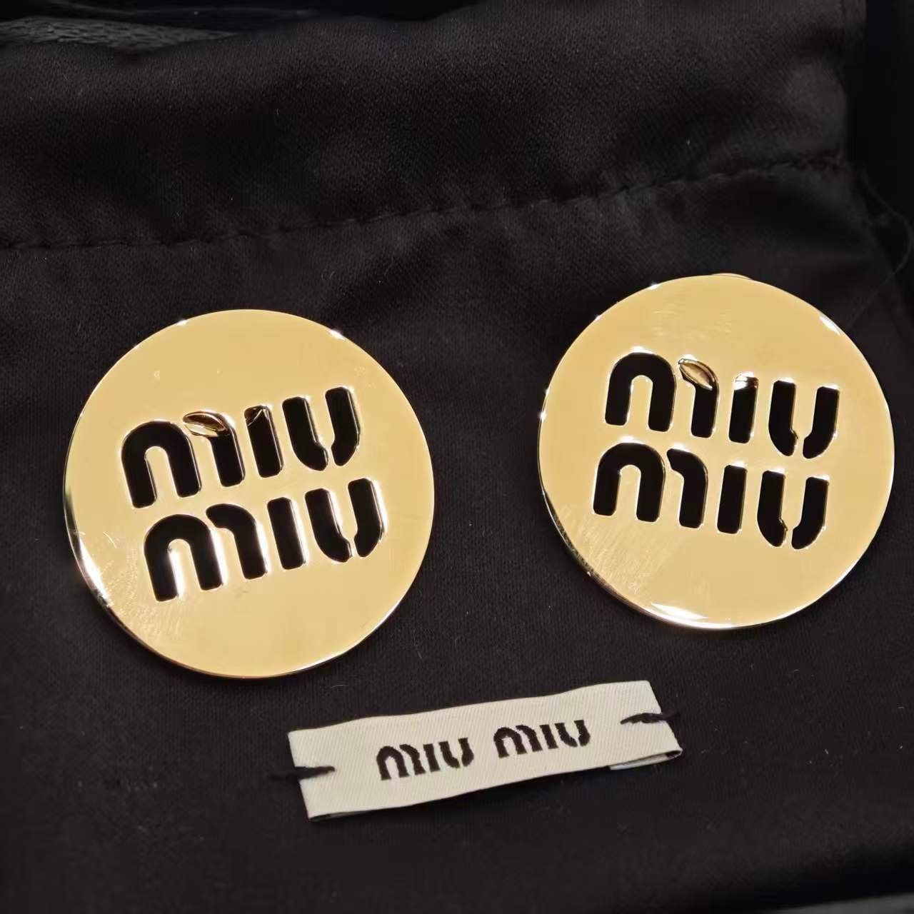 Miu Miu Miu Miu Circular Hollow Logo Earrings Size ONE SIZE - 1 Thumbnail