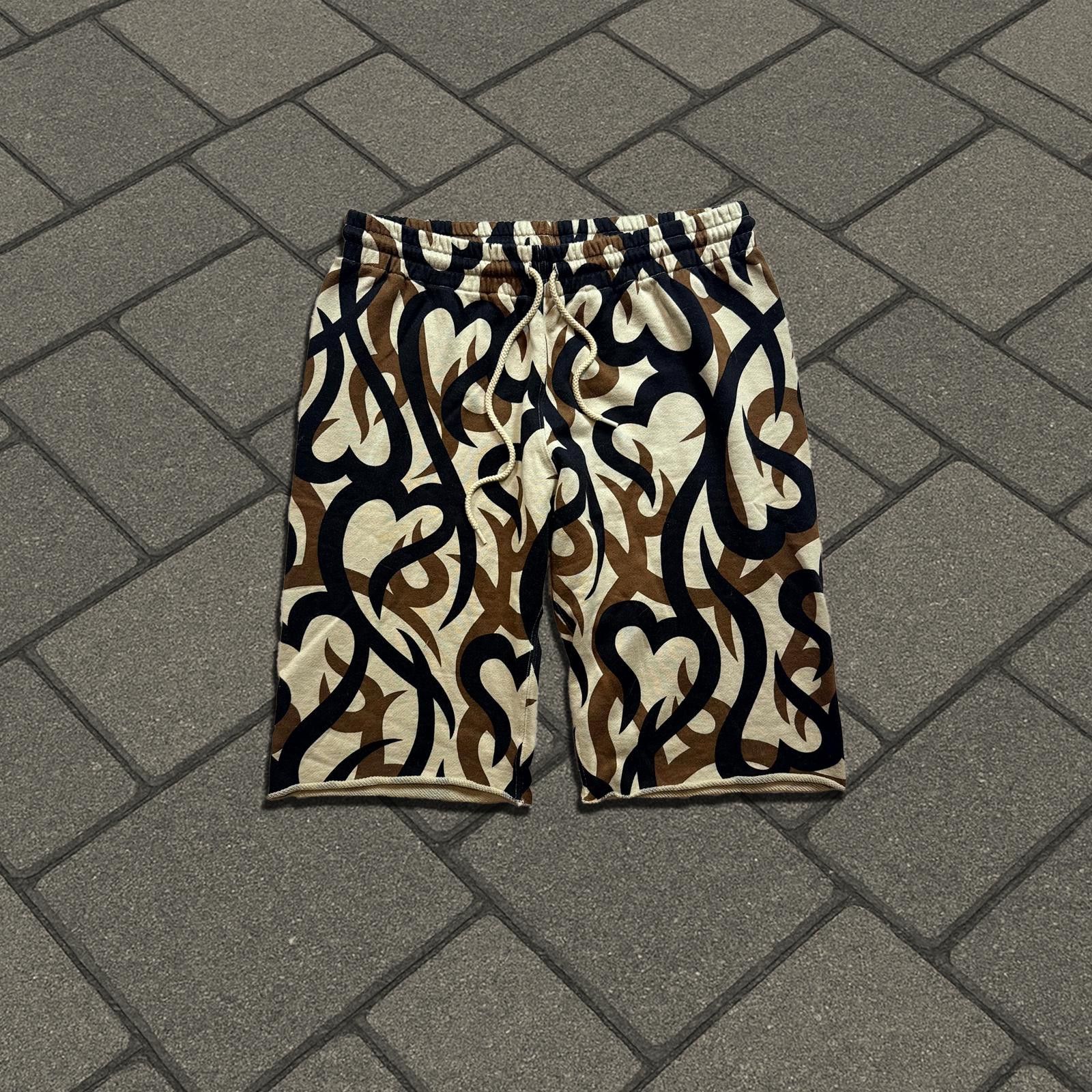 Number (N)ine Number (N)ine AW04 Tribal Heart Camo Shorts | Grailed