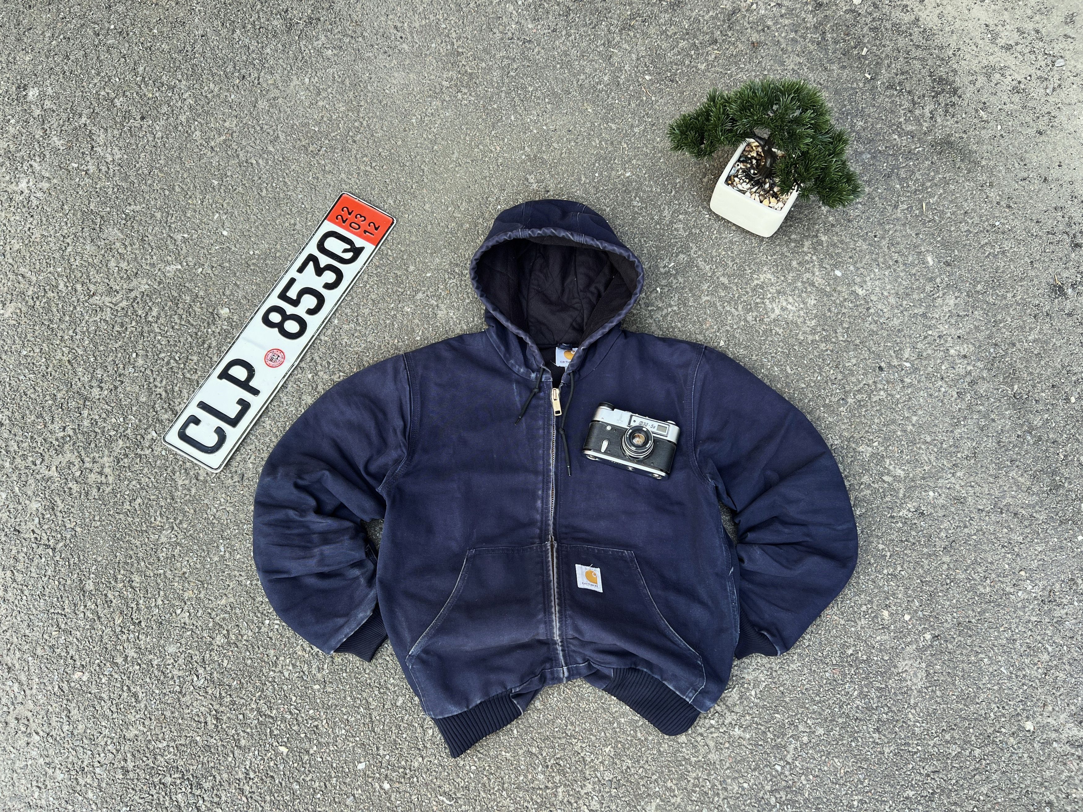 image of Vintage Carhartt Sunfaded Hooded Active Jacket in Dark Blue, Men's (Size Medium)