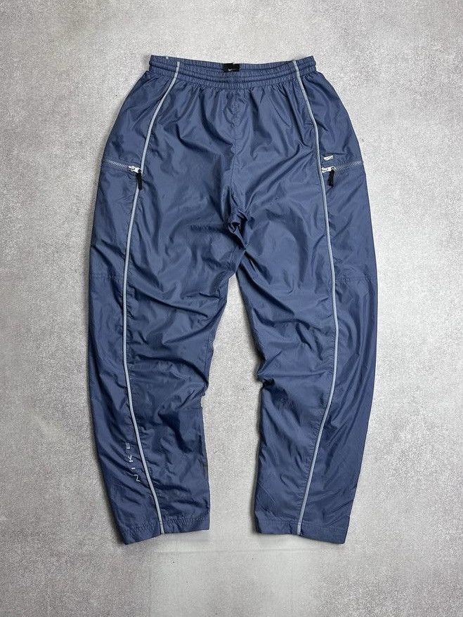 Nike Vintage Nike Swoosh Blue Nylon Track Pants Y2K L Size US 34 / EU 50 - 1 Thumbnail