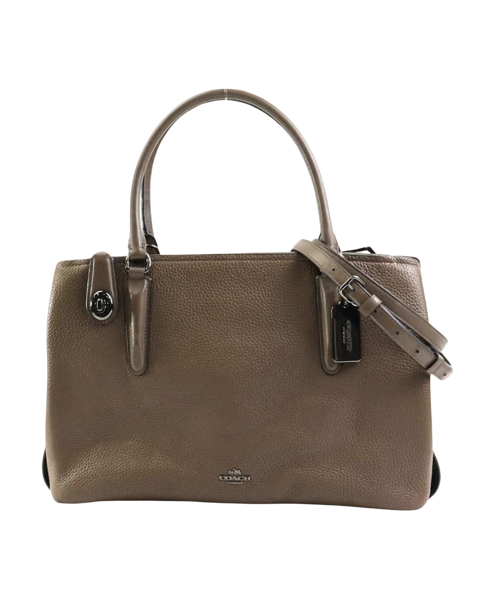 image of Coach Versatile Leather Handbag With Shoulder Strap And Handle in Brown, Women's