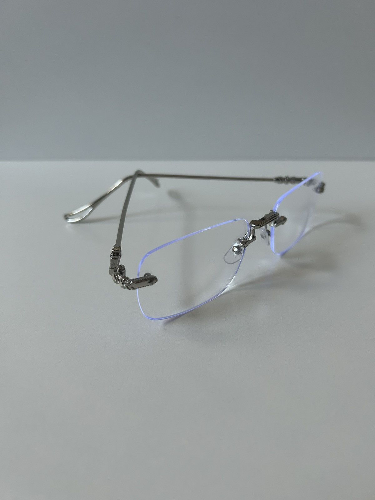 Japanese Brand 90s Y2K style silver cross rimless blue tint lux glasses Size ONE SIZE - 7 Thumbnail