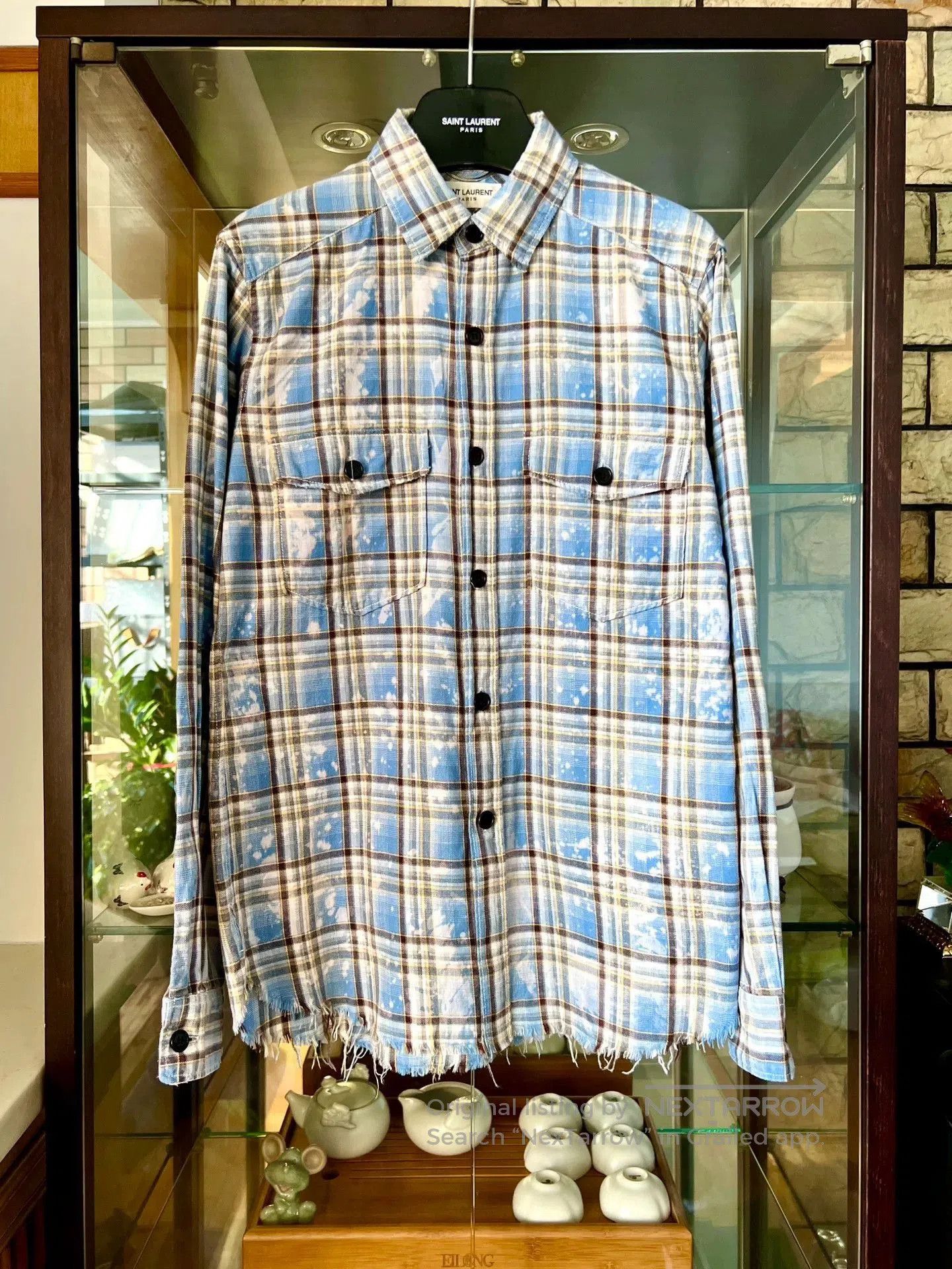 saint laurent blue distressed button-up shirt.