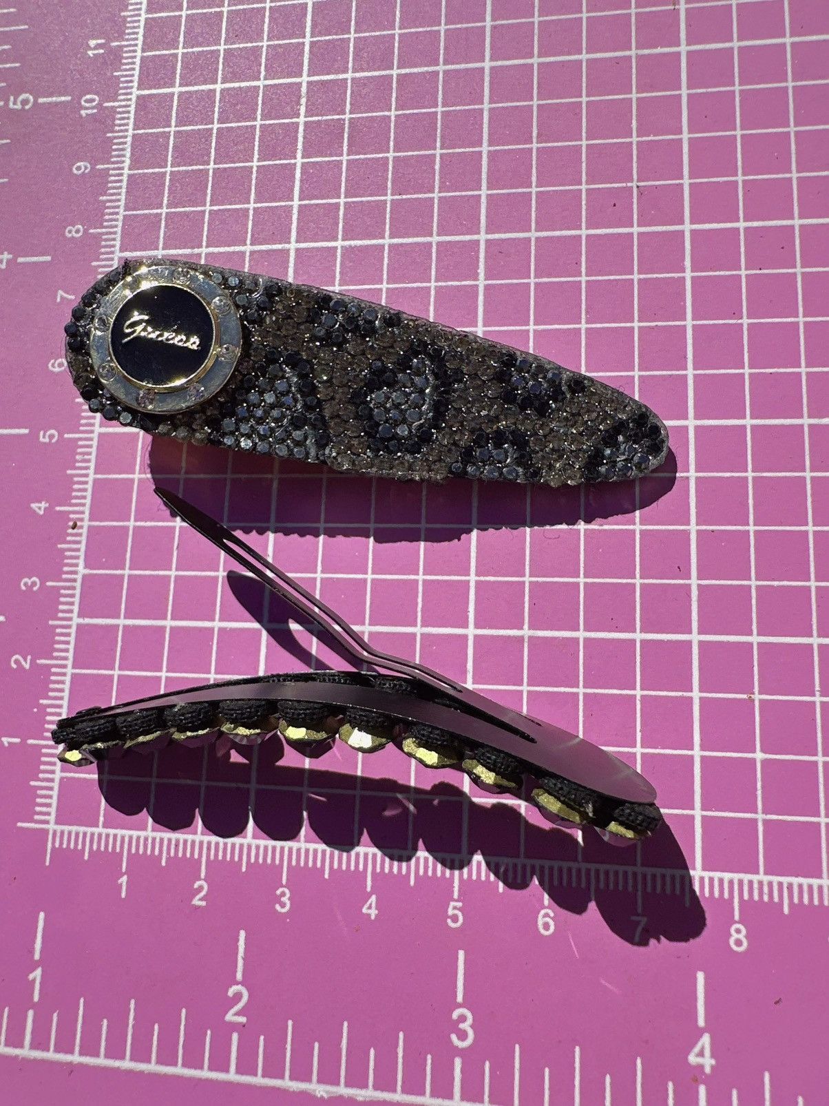 Guess Guess hair clips golden logo animal print shiny diamonds Size ONE SIZE - 6 Thumbnail
