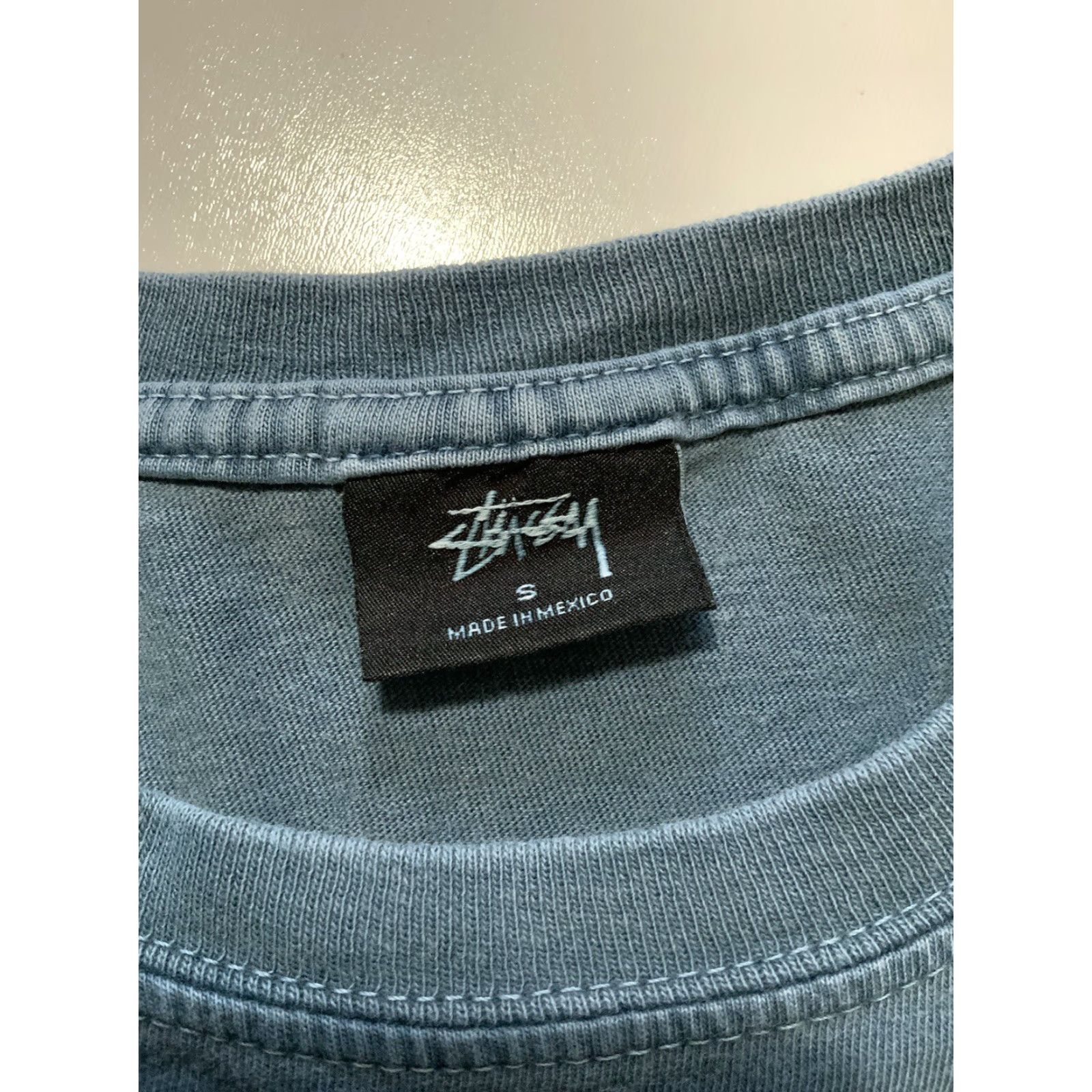 Vintage Stussy Pigment Dyed Blue Dice Skateboarding Graphic L/S Crewneck T-Shirt Sz. S Mens Blue Dice Skateboarding Graphic L/S Crewneck T-Shirt Sz. S Size US S / EU 44-46 / 1 - 6 Thumbnail