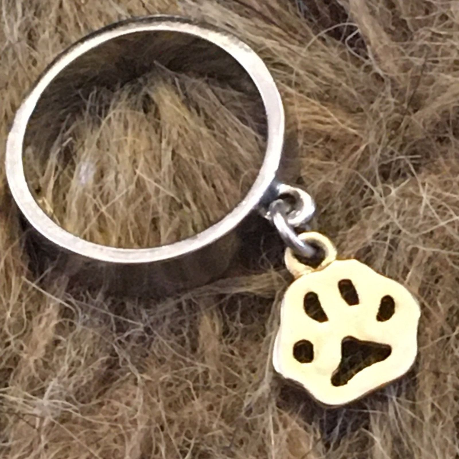 Jewelry Silver band with gold paw print charm ring Size ONE SIZE - 8 Thumbnail