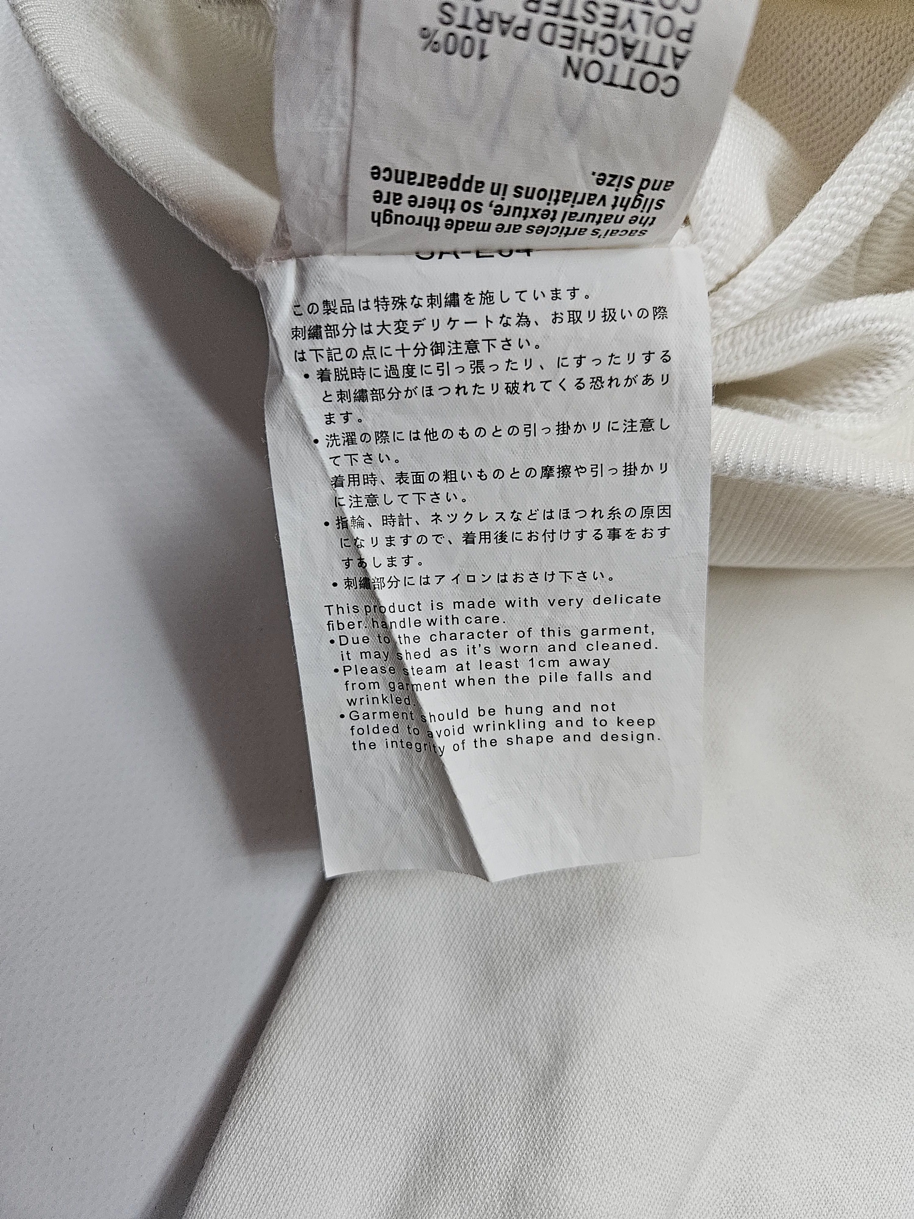 Sacai white cut-out shoulder hoodie