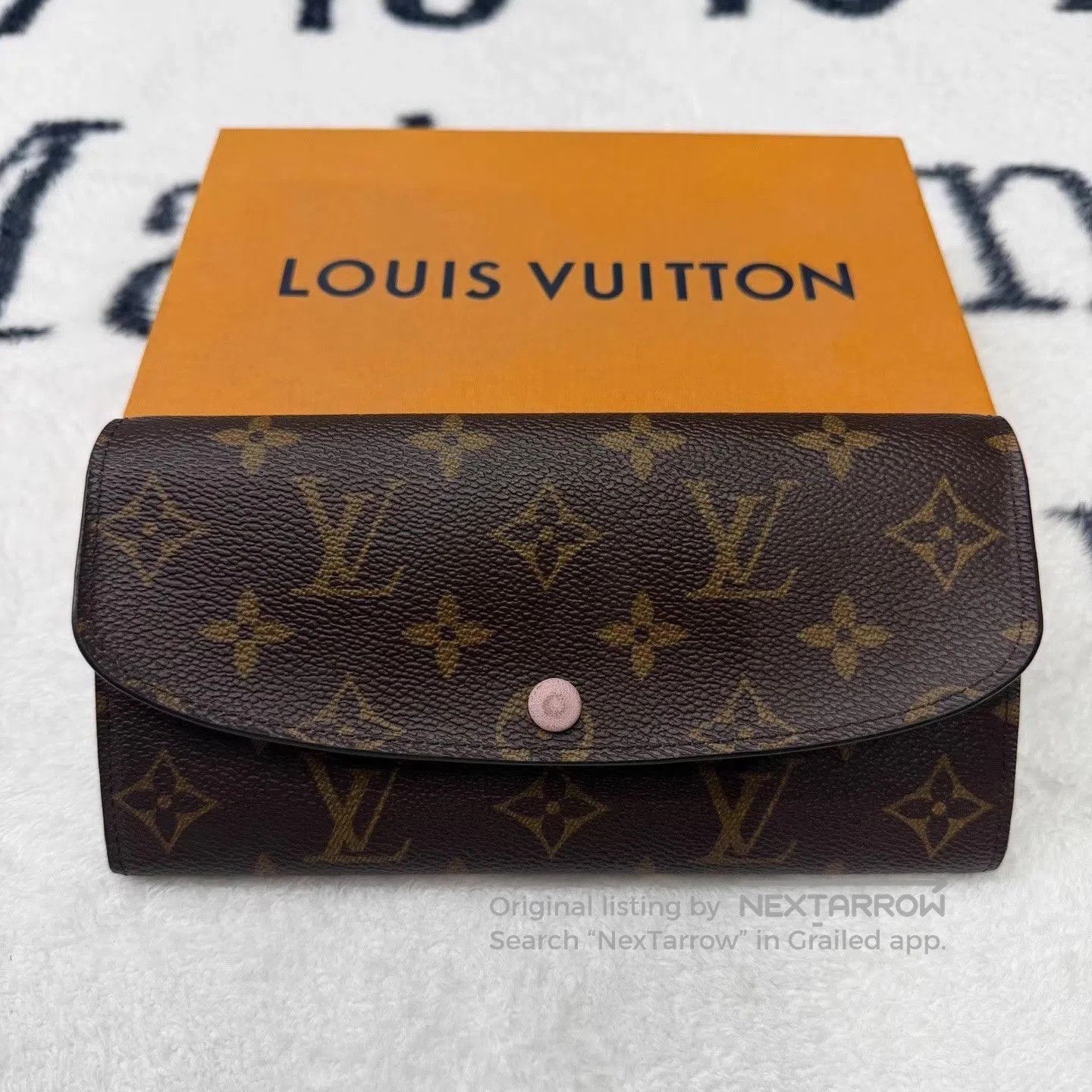 Louis Vuitton Brown Patterned Foldover Wallet. Size ONE SIZE - 1 Thumbnail