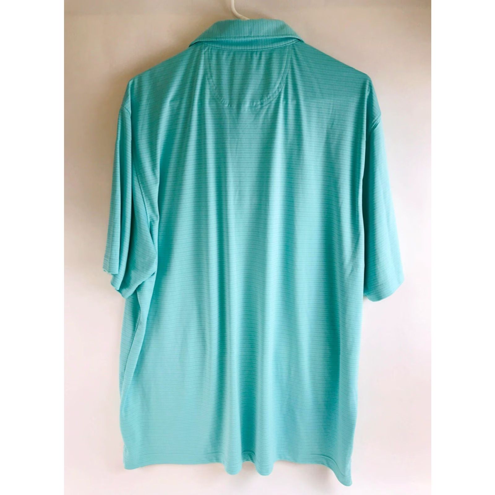 Greg Norman ML75 Polo Shirt Men\'s XL Turquoise Short Sleeve Polo 1/4 Button Up Breathable Vintage? No (adjusted for clarity)