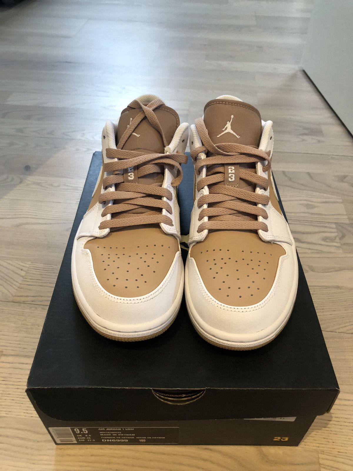image of Nike Air Jordan 1 Low Shoes in White, Men's (Size 9.5)