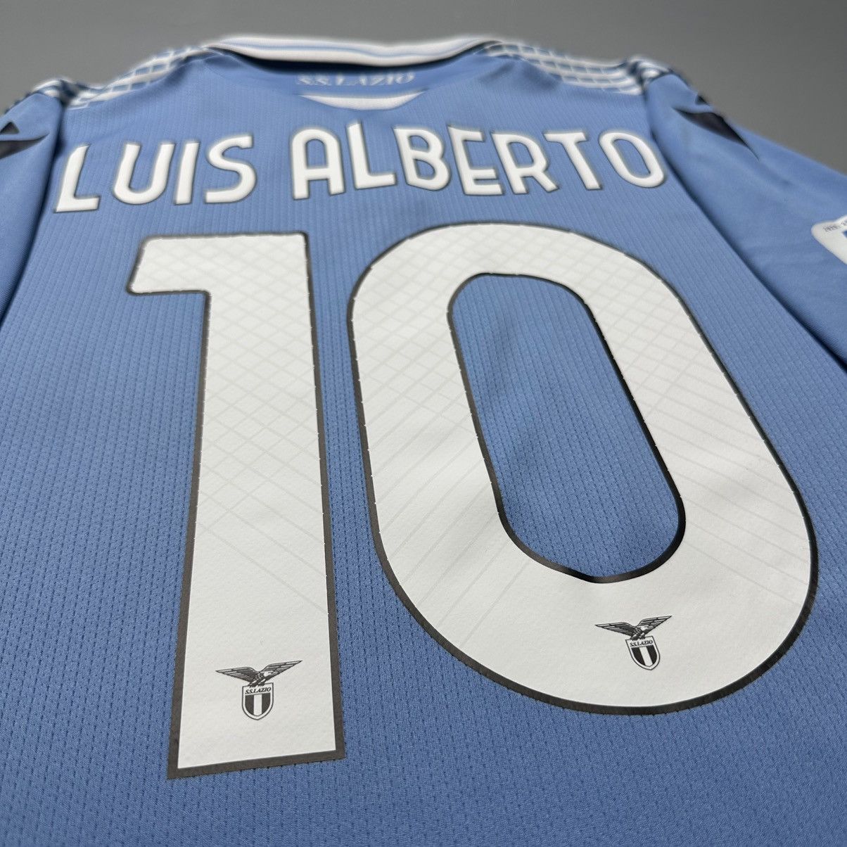Macron LAZIO MACRON 2020/2021 FOOTBALL HOME JERSEY #10 LUIS ALBERTO Size US L / EU 52-54 / 3 - 12 Thumbnail