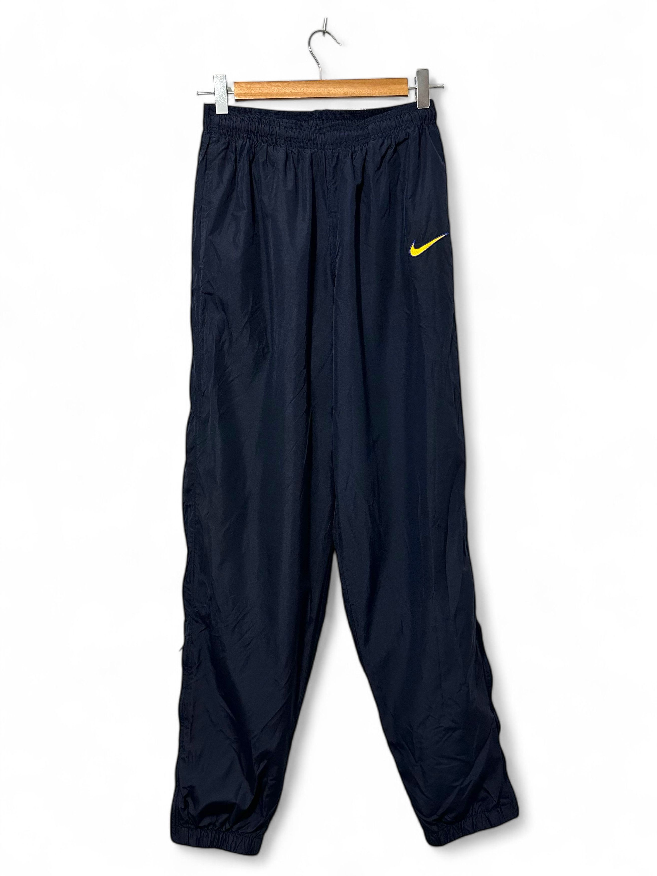 Nike × Vintage Vintage Nike Nylon Track Pants Blue Ukranian Swoosh (M) Size US 32 / EU 48 - 1 Thumbnail