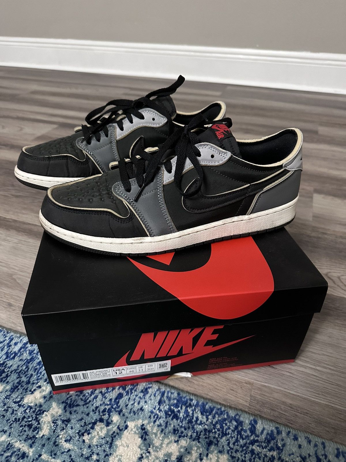 image of Nike Jordan 1 Low OG Ex Shoes in Black, Men's (Size 12)