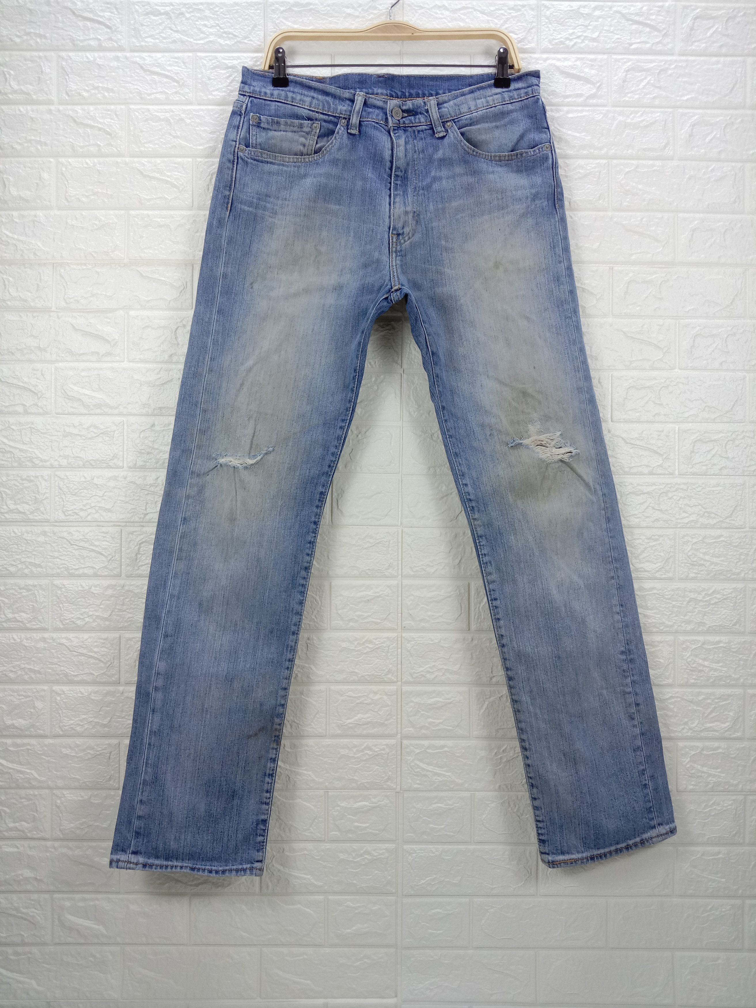 Vintage Levi's 505 Jeans Faded Blue Ripped Denim