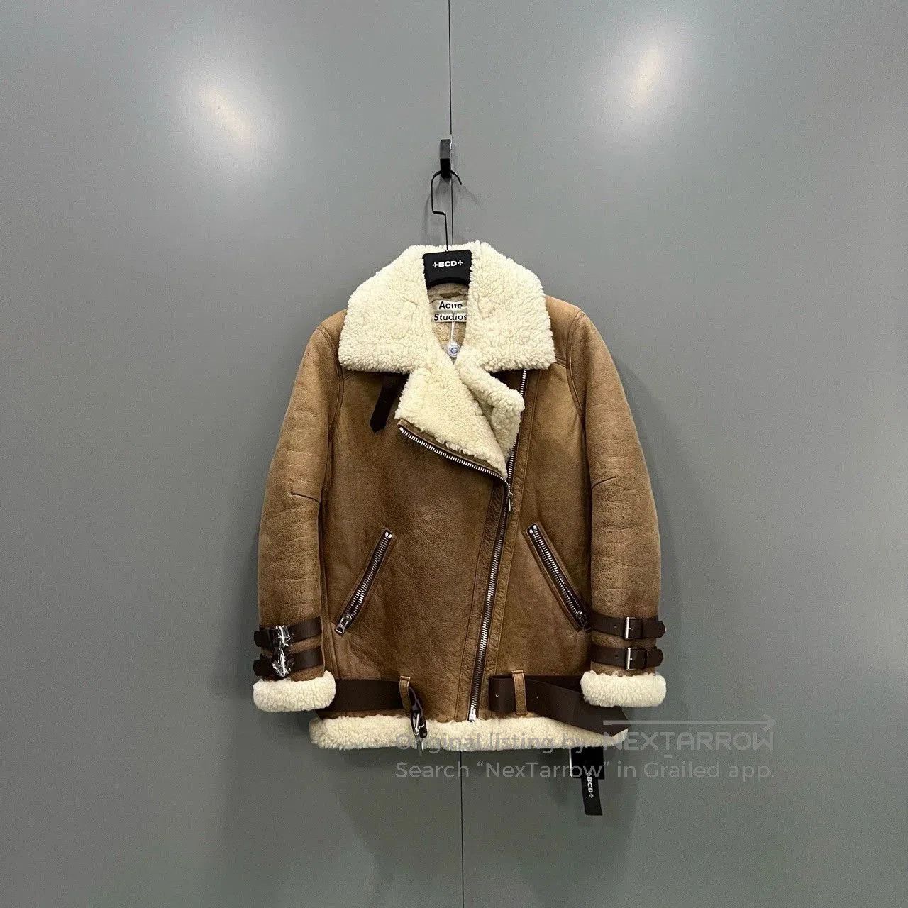 brown shearling jacket by Acne Studios.