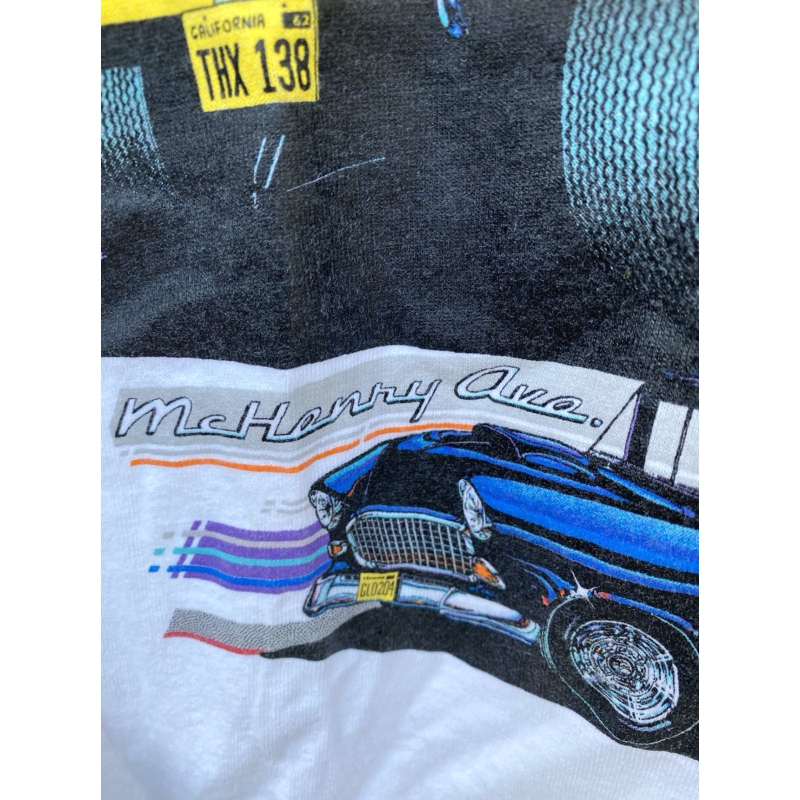 Fruit Of The Loom VINTAGE American Graffiti Night Mels Deive In Modesto 1992 T-Shirt Tee XL White USA 90s Cars City Thread: Fruit of the Loom Men T-Shirt Size US XL / EU 56 / 4 - 4 Thumbnail