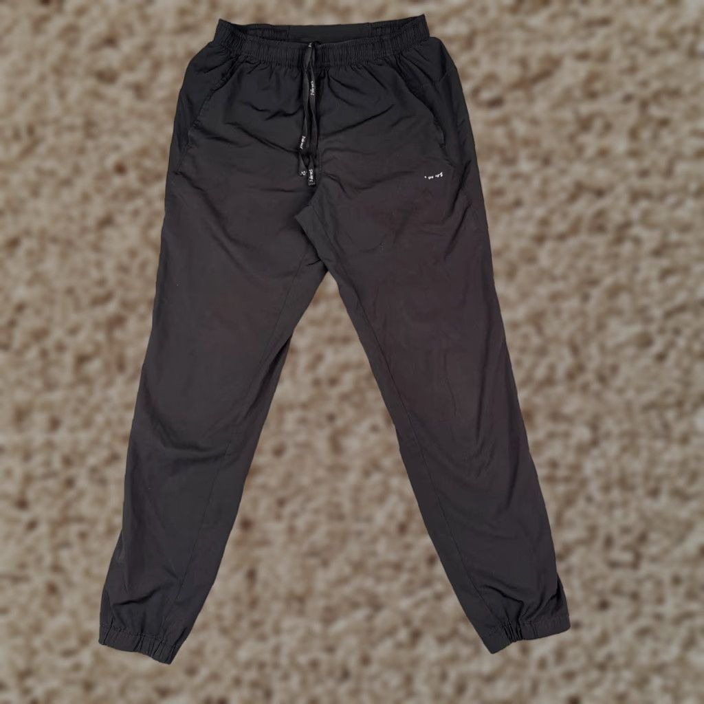 Vintage Hind Track Pants Men Adult Small Black Tapered Leg Ankle Zip Rear Pocket Nylon Microfiber Size US 29 - 1 Thumbnail