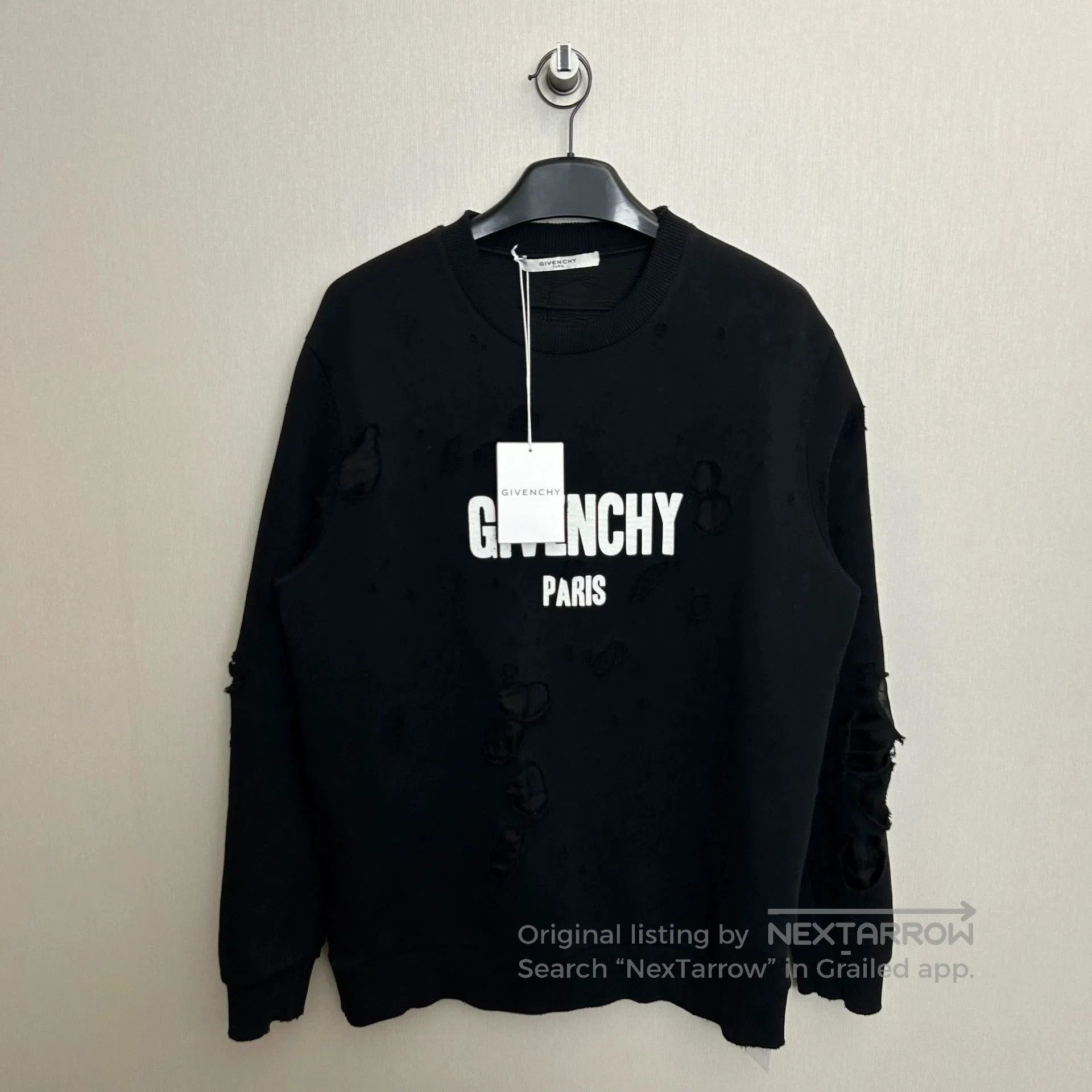 givenchy distressed black sweatshirt size L.
