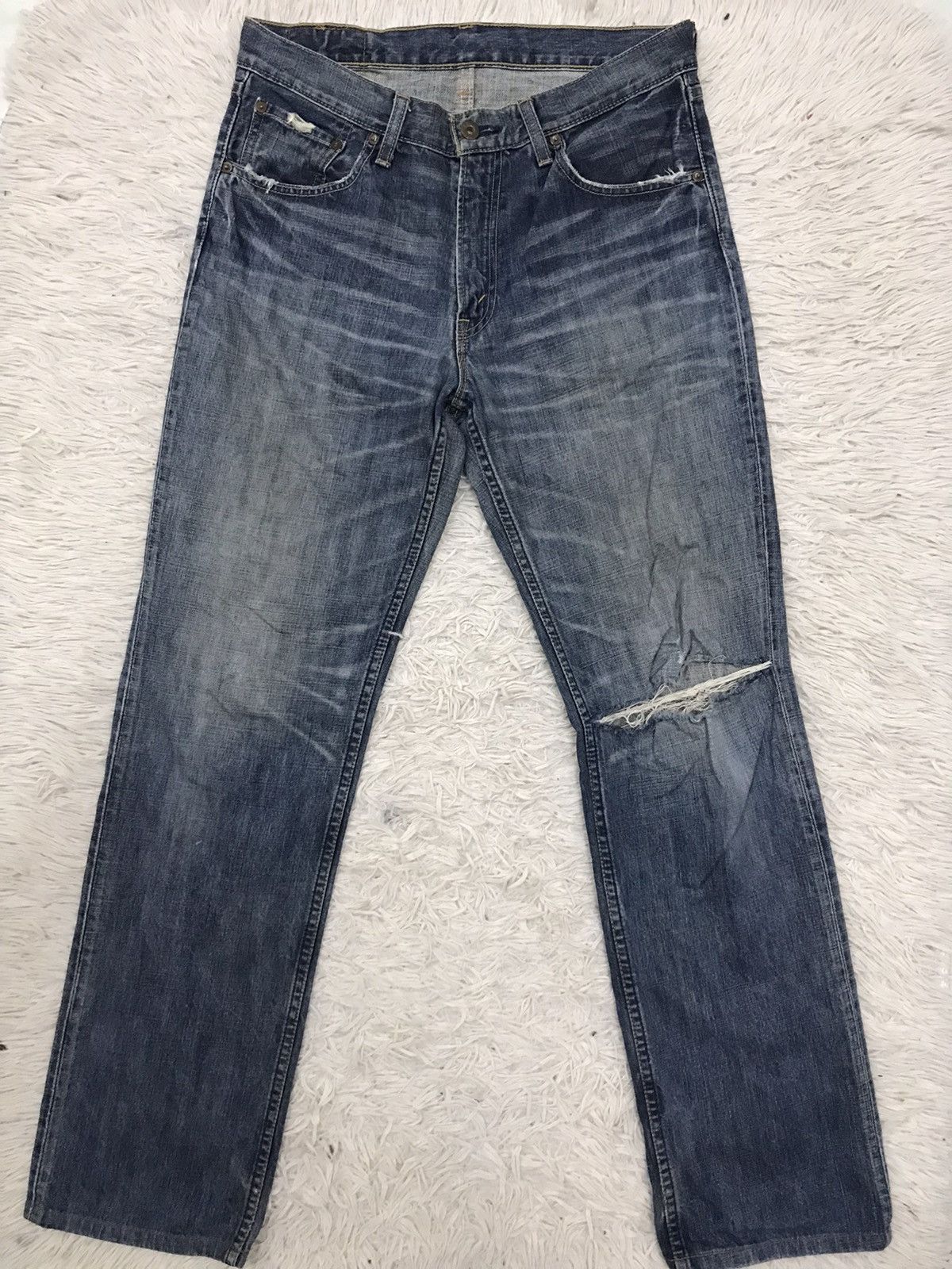 Vintage Levis Lot 502 Regular Cut Distressed Denim Jeans