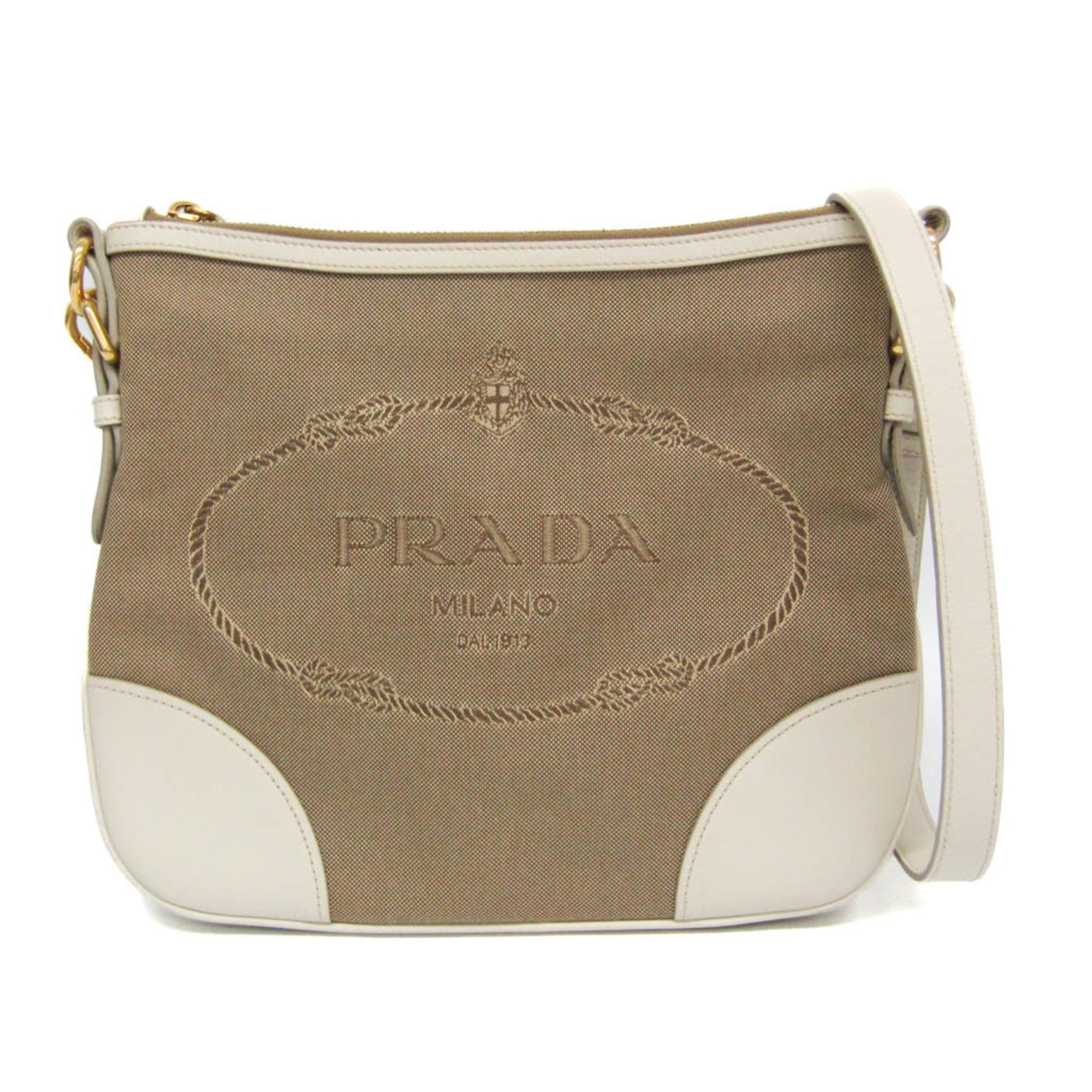 Prada Prada LOGO JACQUARD BT867A Women's Canvas,Leather Shoulder Bag Beige,Off-white Size ONE SIZE - 1 Thumbnail