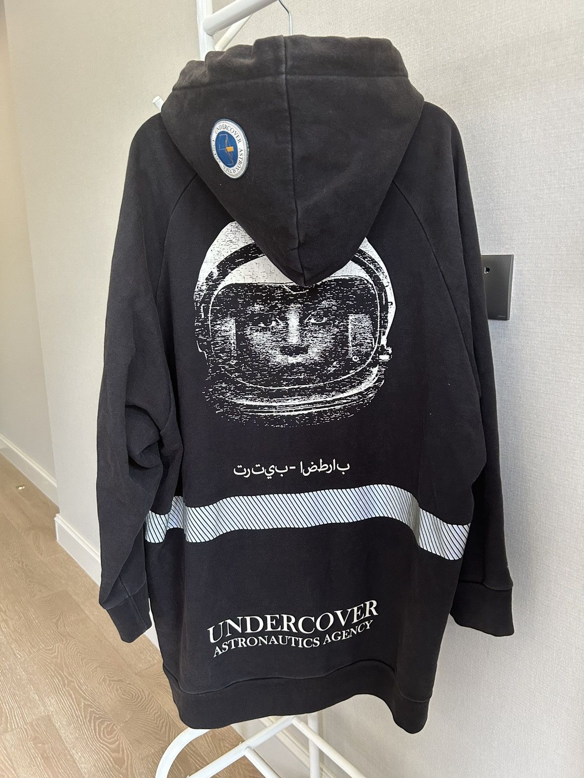 image of Undercover Astronaut Lifeguard Design Zip-Up Hoodie in Black, Men's (Size Medium)