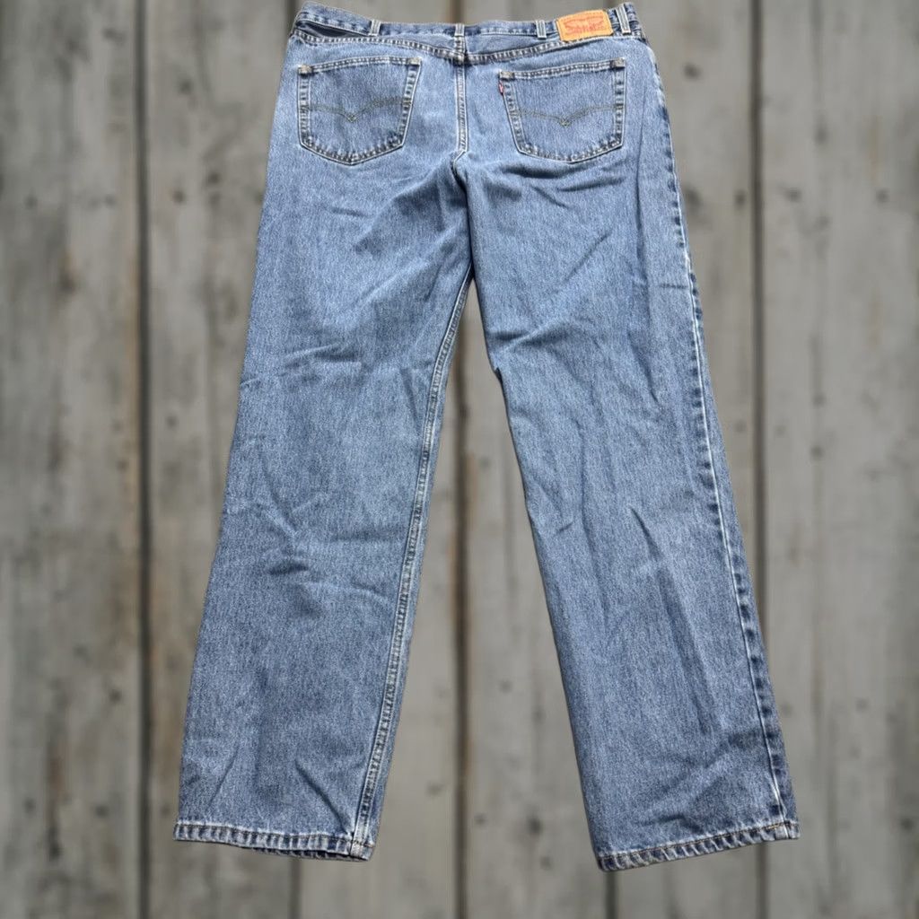Vintage Levi 550 Denim Jeans Men 38x34 Light Blue Washed Relaxed Fit Original Denim Straight Jeans Mens Blue 550 Levi Jeans Vintage style? Size US 38 / EU 54 - 1 Thumbnail