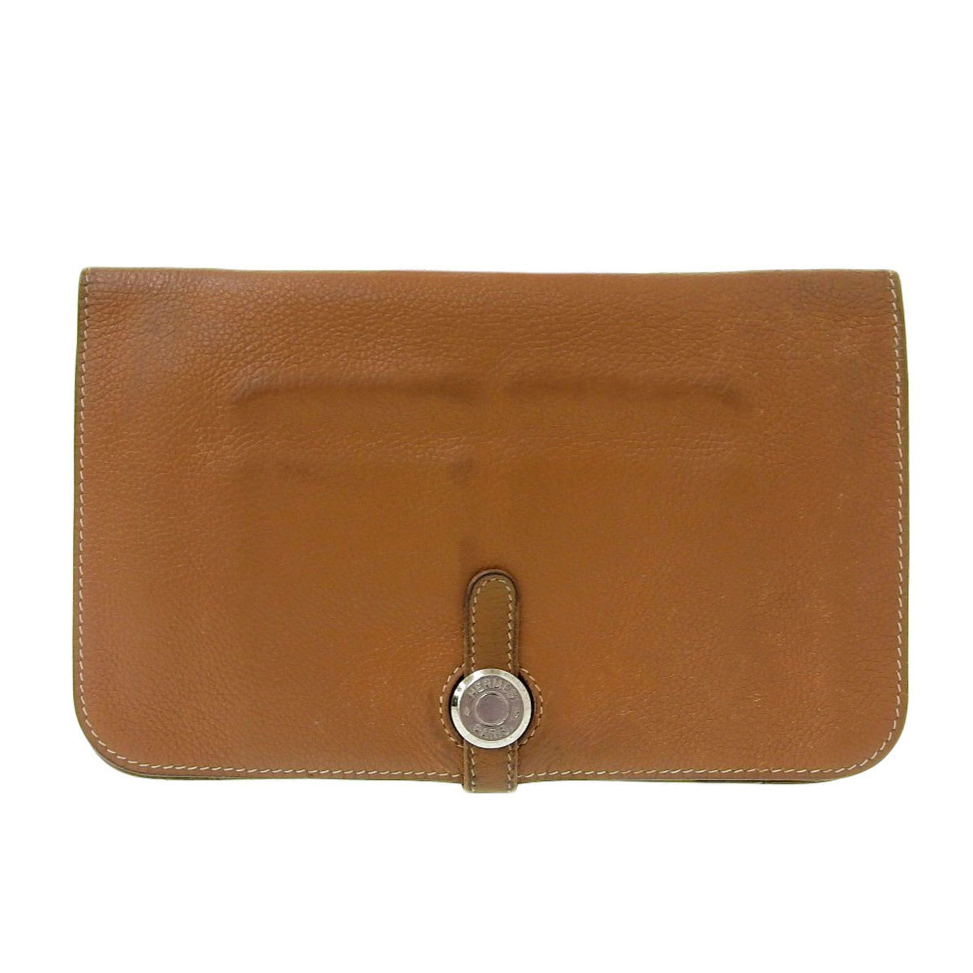 image of Hermes Dogon Gm Bi-Fold Long Wallet Taurillon Clemence Gold E Engraved in Black, Women's