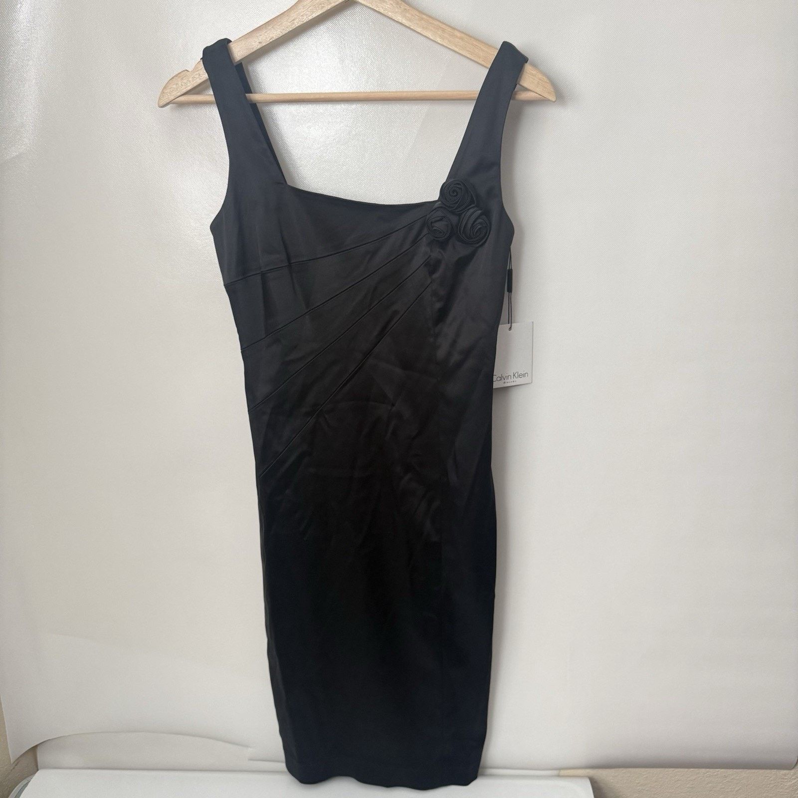 sheike black peplum dress Calvin Klein Black Sleeveless Sheath Dress with Textured Neckline – SilkRoll main image 1